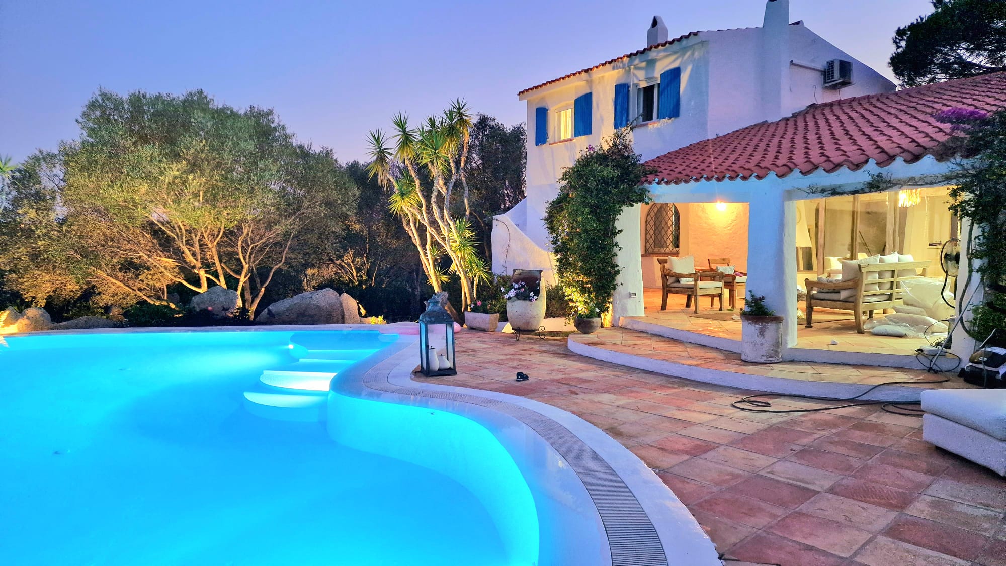 Illuminated villa at dawn