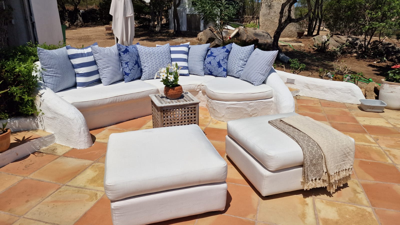 Outside sofa by the pool