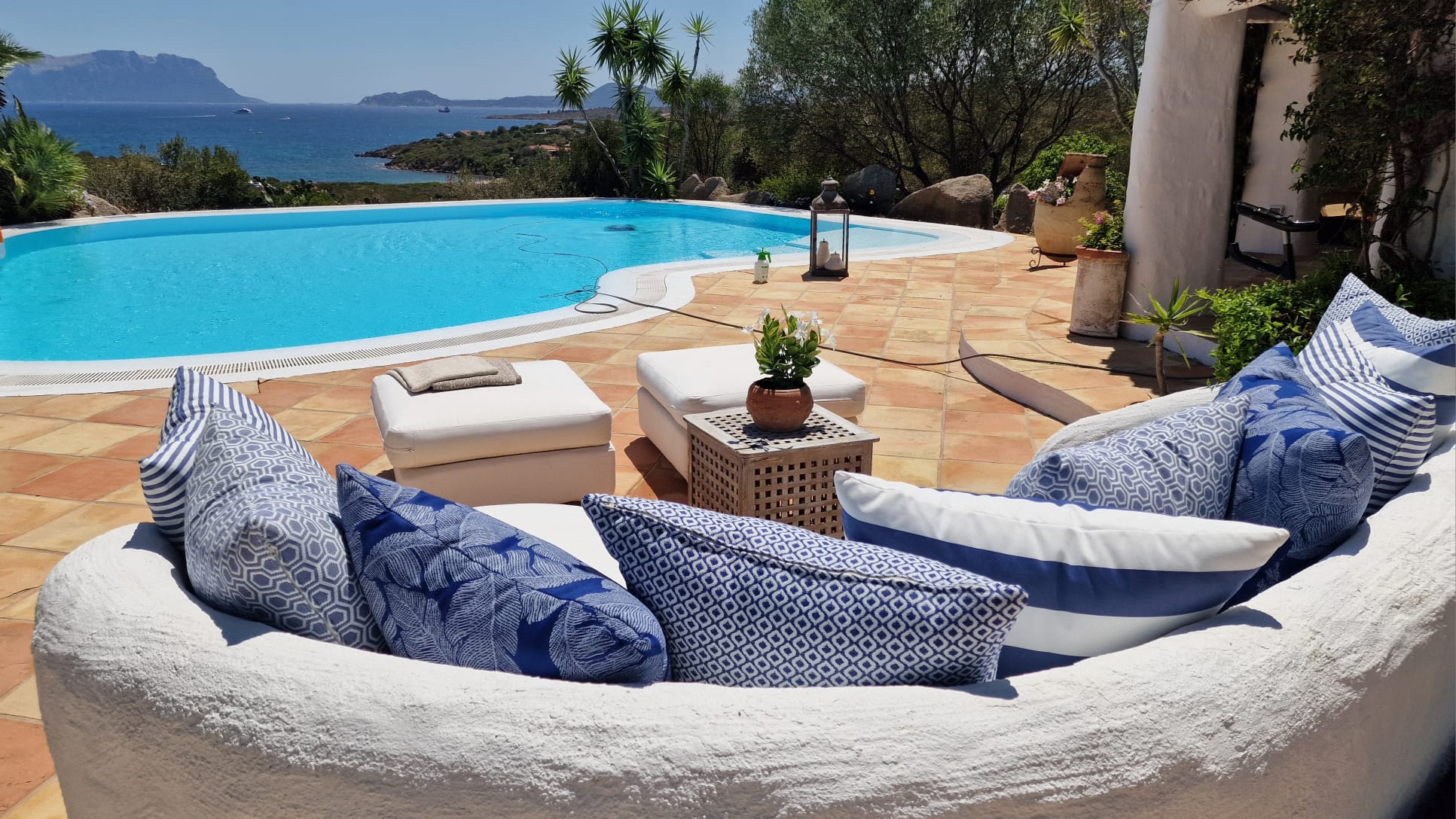 Sunny day pool seaview terrace sofa